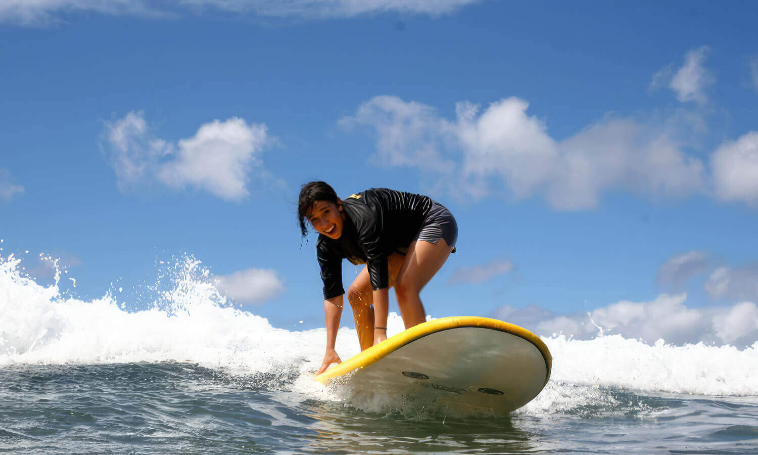 Learning to surf on Oahu's North Shore